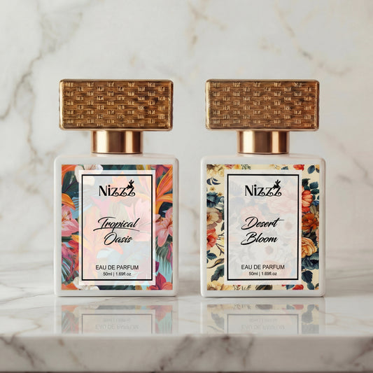 Amber Oasis layering combo: Desert Bloom and Tropical Oasis Eau de Parfum bottles