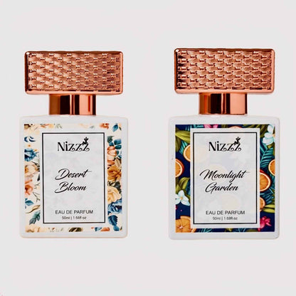 Two floral perfume bottles: Desert Bloom and Moonlight Garden Eau de Parfum with rose gold caps