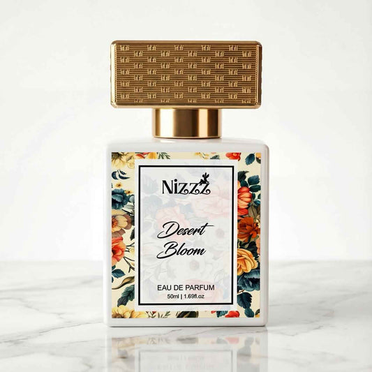 Nizzz Desert Bloom Eau de Parfum bottle with floral label and gold cap on marble surface