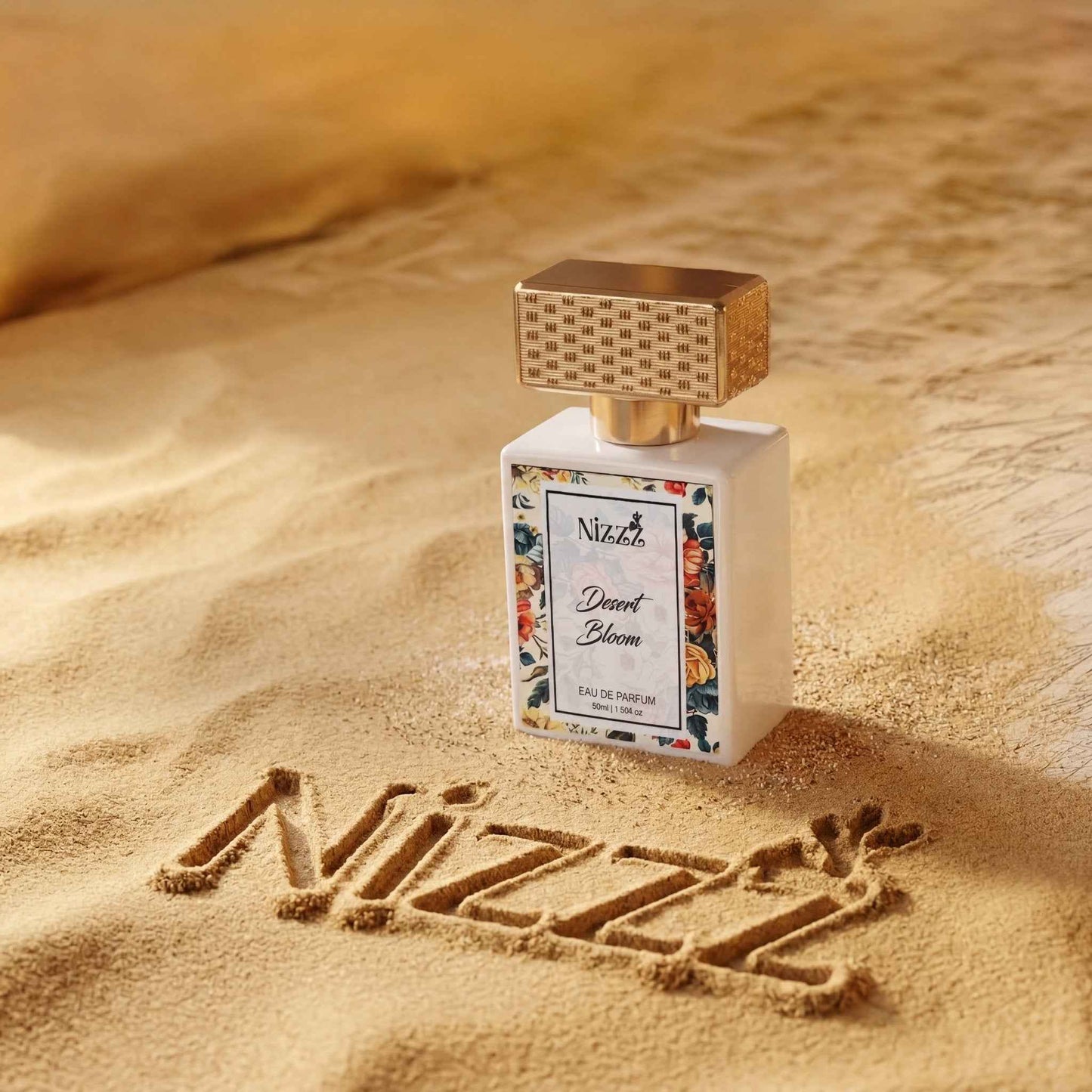 Nizzz Desert Bloom Eau de Parfum bottle in golden sand, floral label, luxury fragrance for women