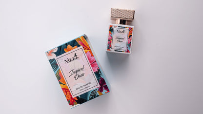 Tropical Oasis Eau de Parfum bottle and box with vibrant floral design, 50ml