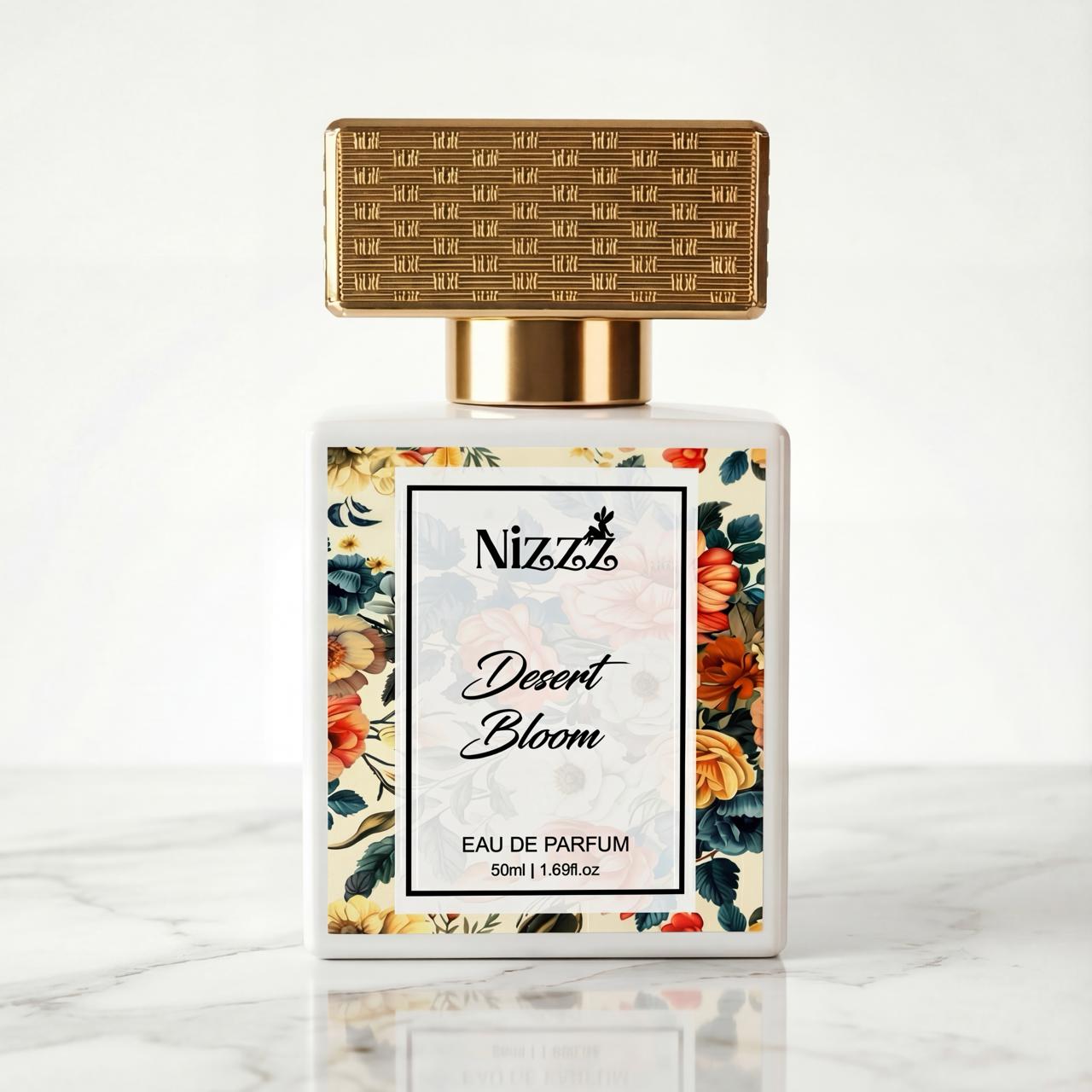 Nizzz Desert Bloom Eau de Parfum bottle with floral label and gold cap on marble surface