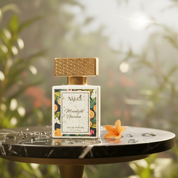 Nizzz Moonlight Garden luxury perfume bottle placed on a table in a sunlit garden setting