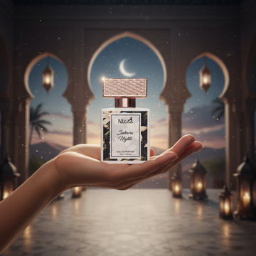Nizzz Sahara Nights luxury perfume bottle held in hand under moonlight in an Arabian palace setting