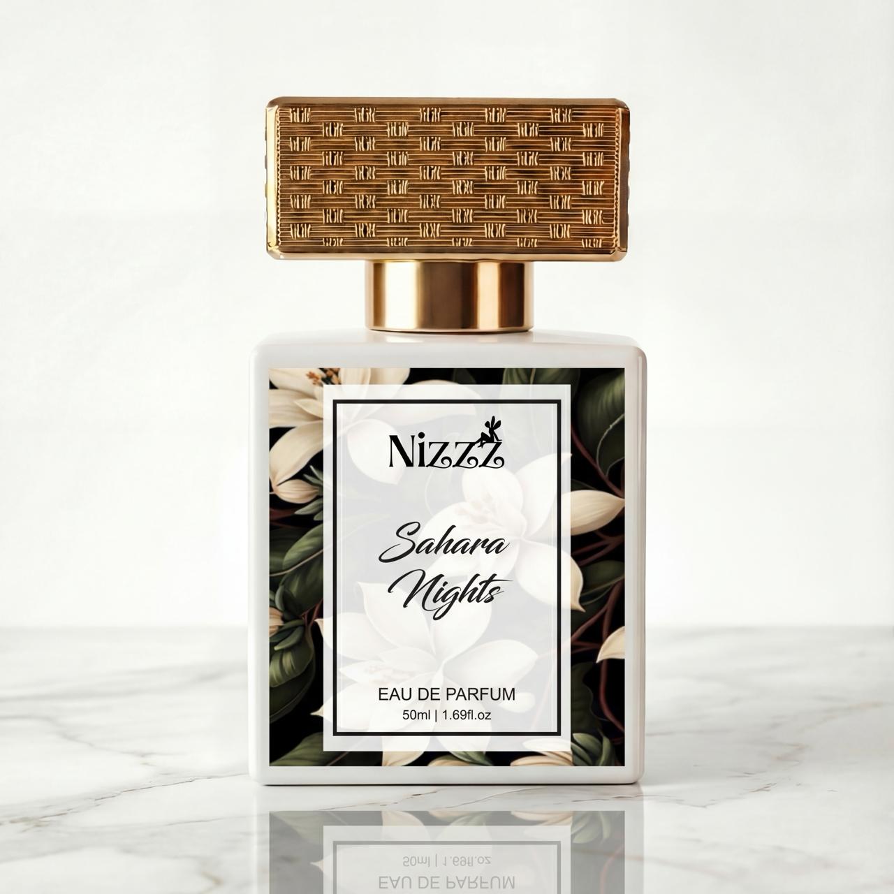 Nizzz Sahara Nights Eau de Parfum bottle with floral design and gold cap on marble surface